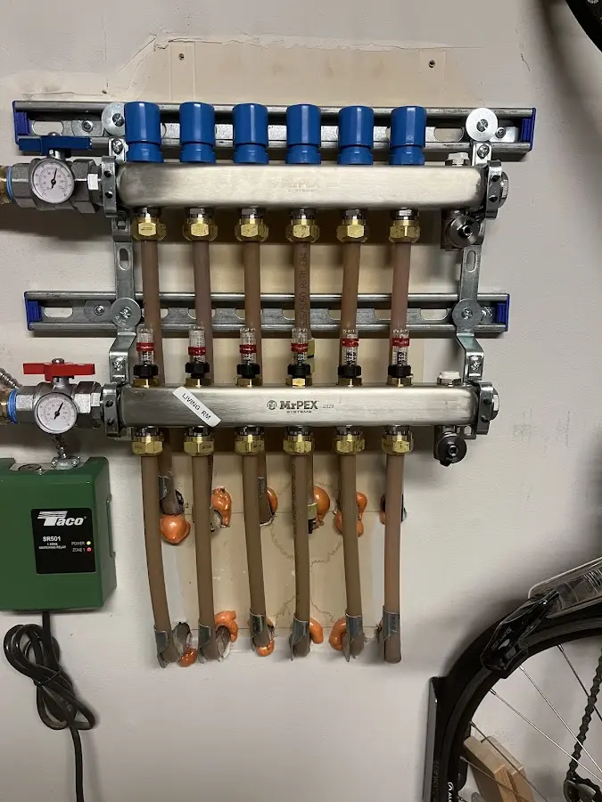 Plumber performing Leak Detection at a residential property in Carroll